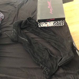 Knee high stiletto boots